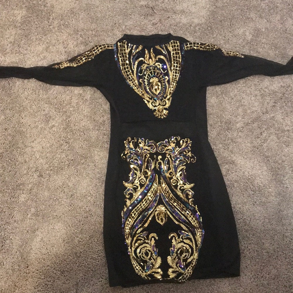 Multi colored sequence and Black dress